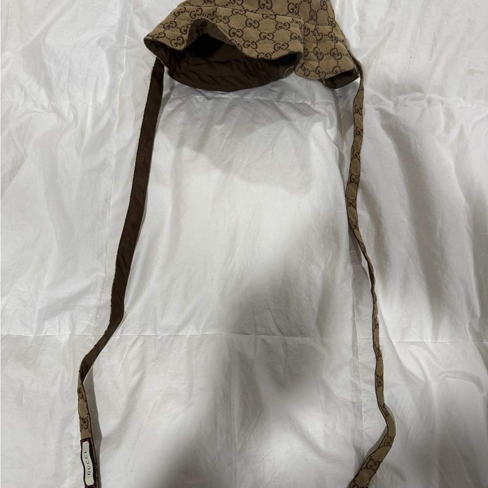 Gucci GG Canvas Bucket Hat with Tie Straps (Brown)